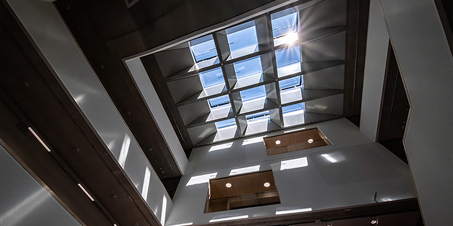 Dark room with large glass rooflight to brighten up area