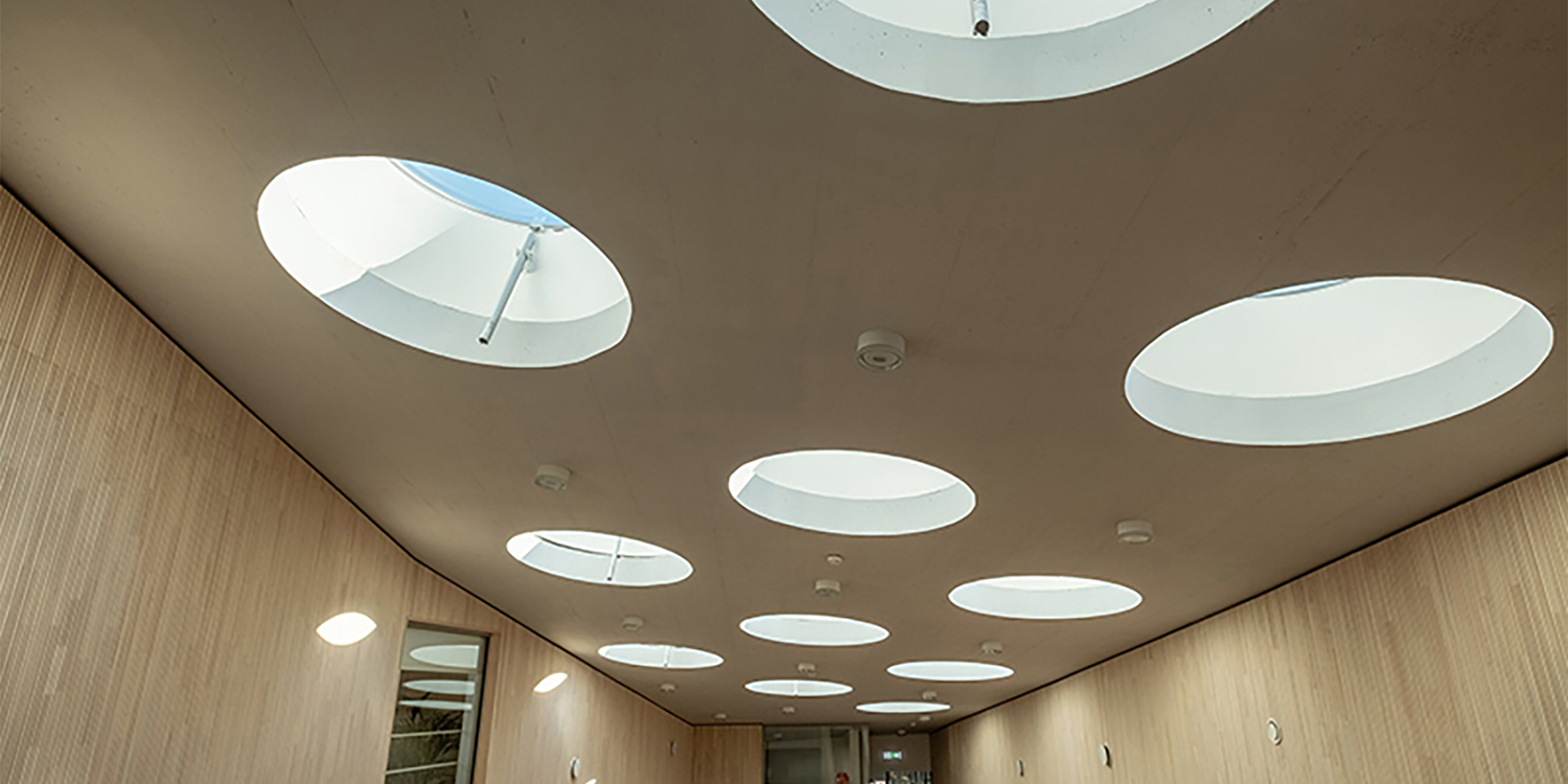 Circular rooflights in ceiling