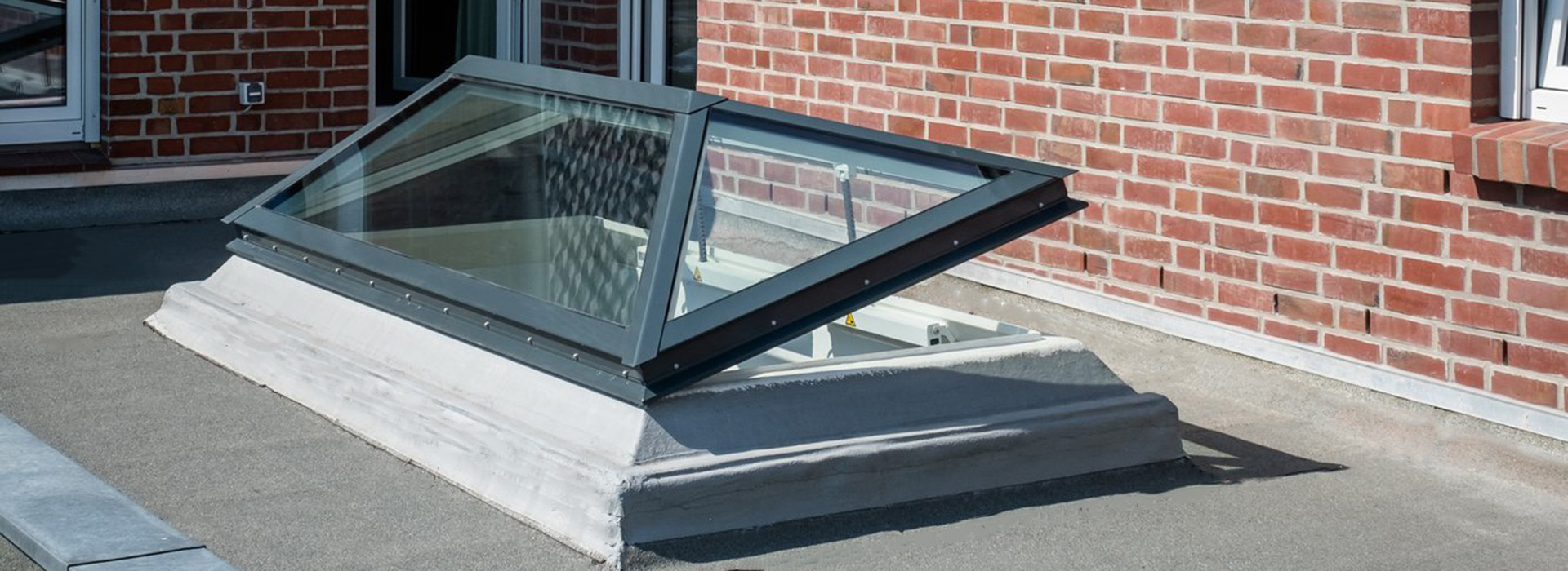 Opening hipped skylight