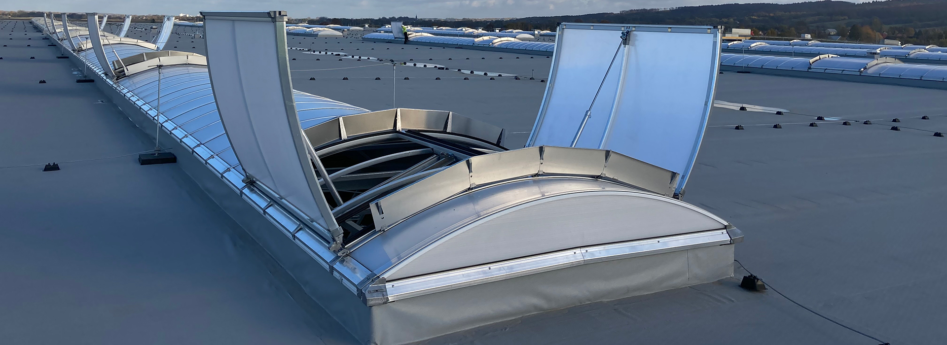 barrel vault rooflight with double opening vent flap