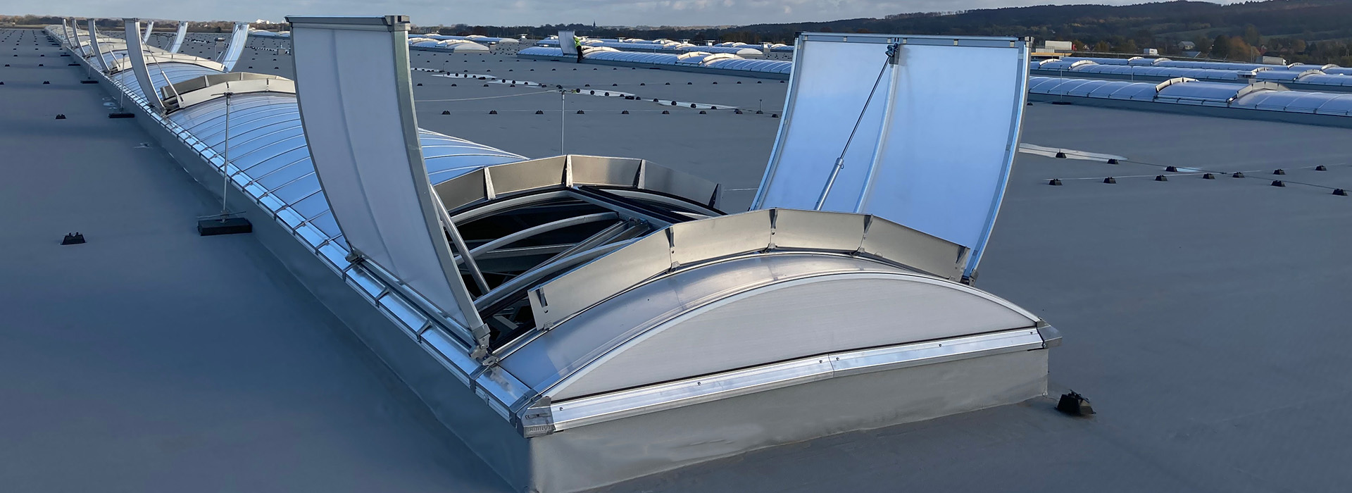 barrel vault rooflight with double opening vent flap