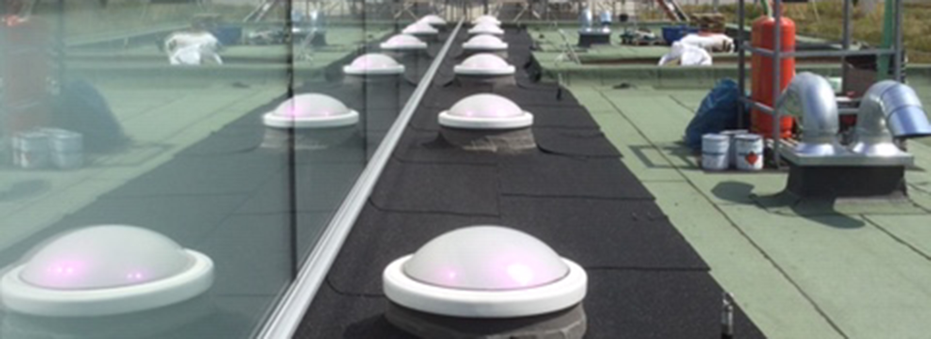 Circular rooflight domes on roof