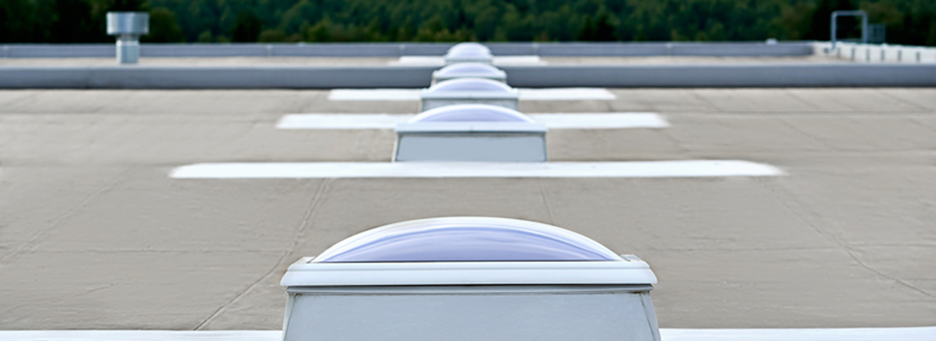 rooflight domes on a roof in a line