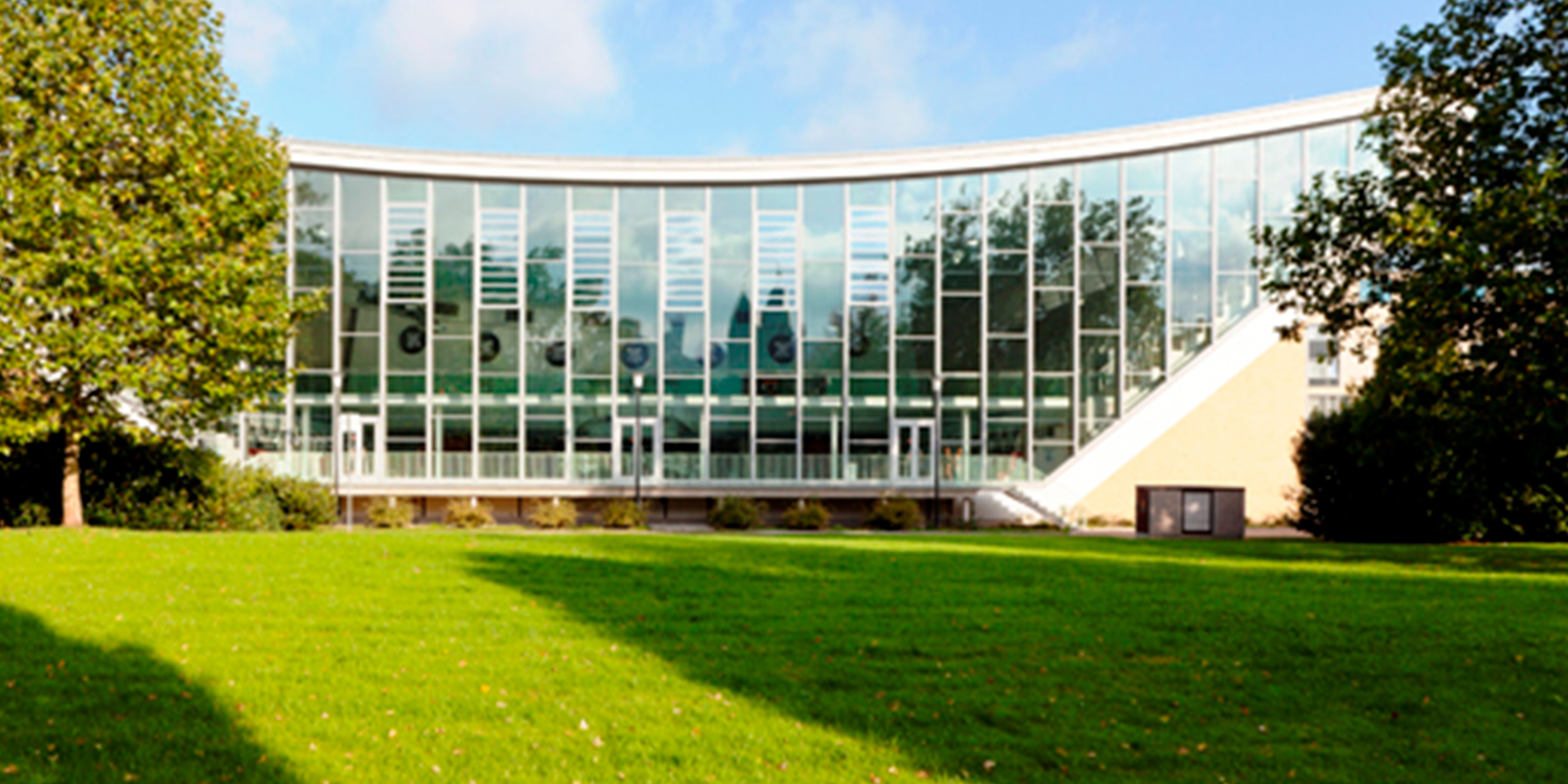 Glass building with glass louvred vents