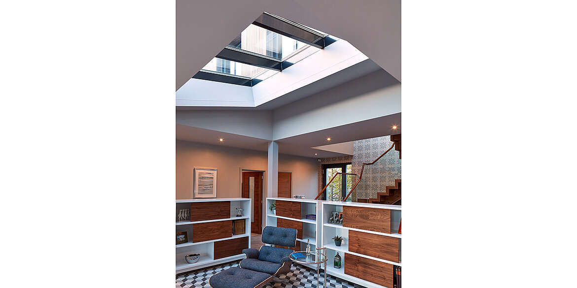 Comfy chair in home under skylight