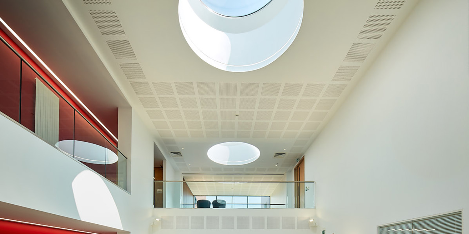Large circular rooflight on ceiling with anotherone further behind