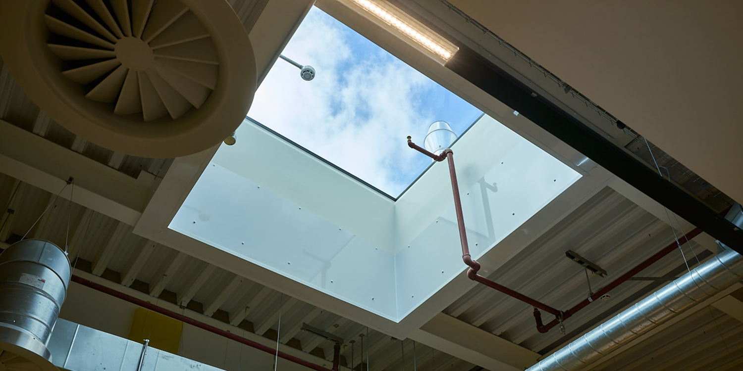internal view looking up to sky from glass skylight