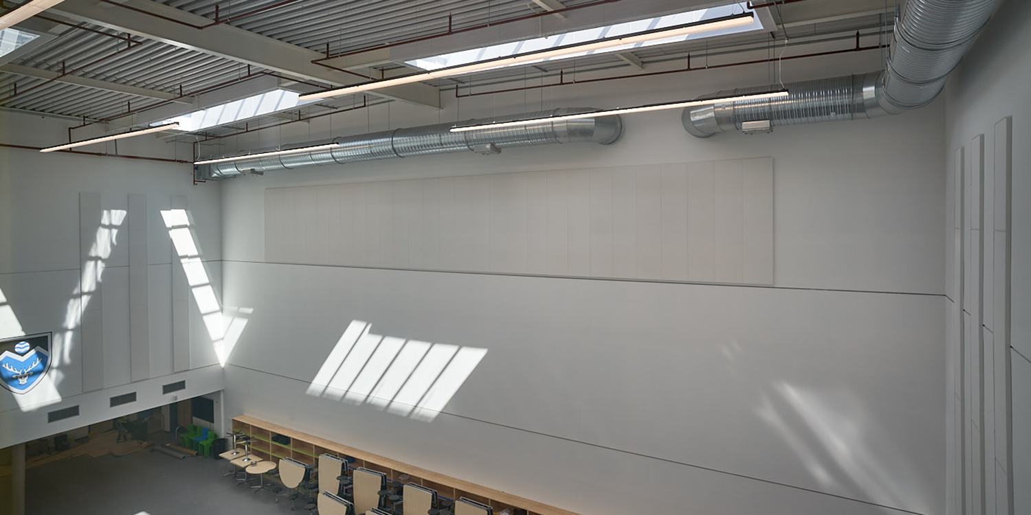 sports hall lit by rooflights