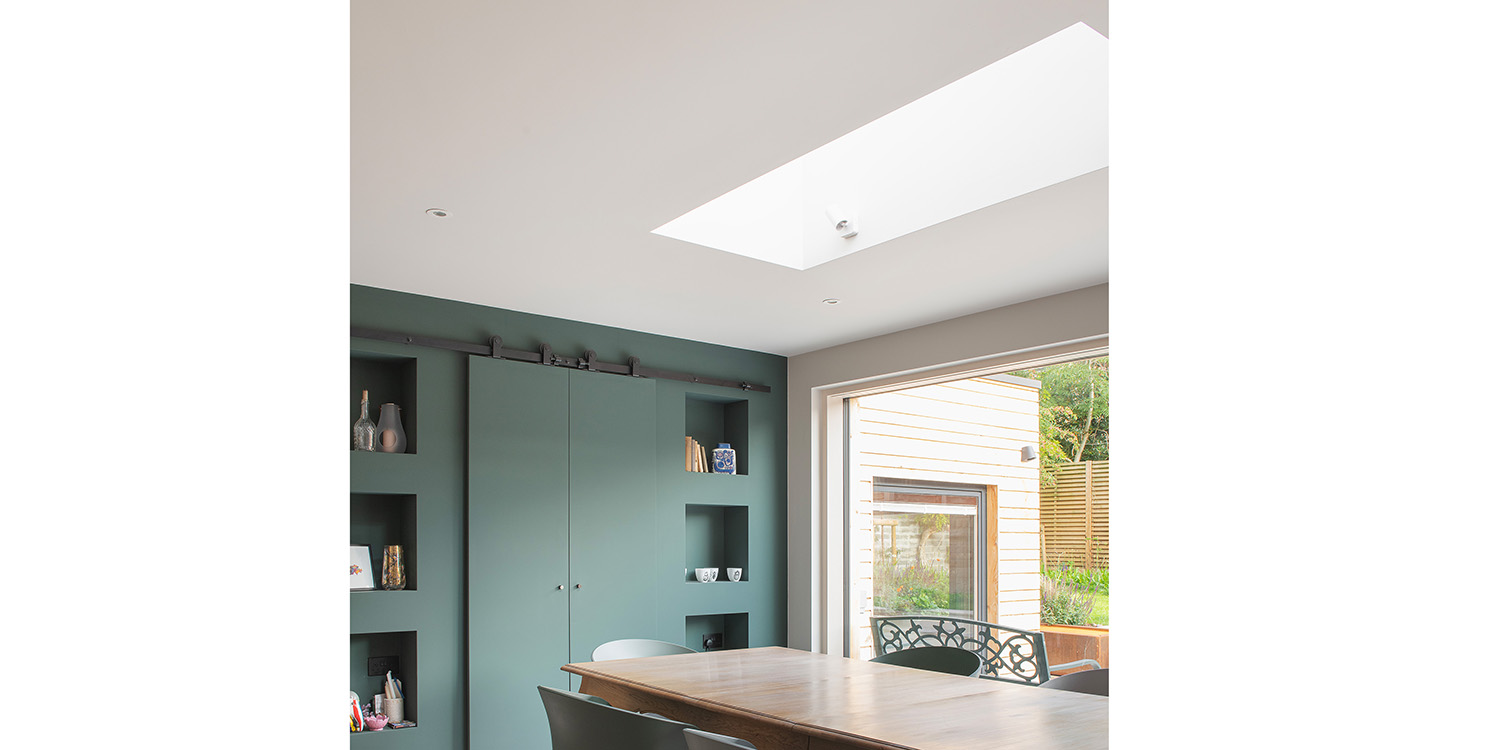 Kitchen extension with glass skylight above table