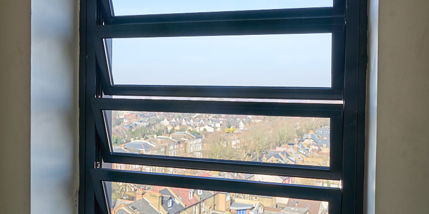 Close up of open louvres in window