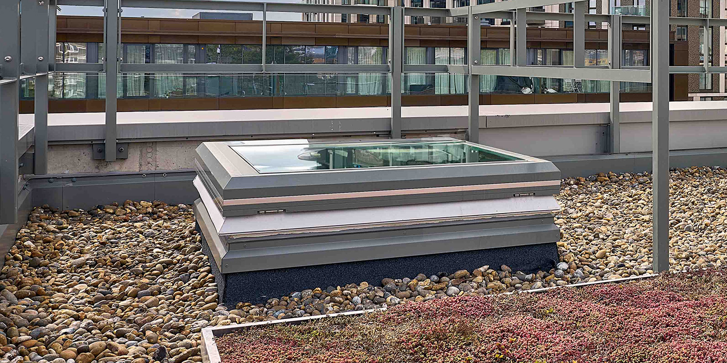 Closed rooflight on shingle roof
