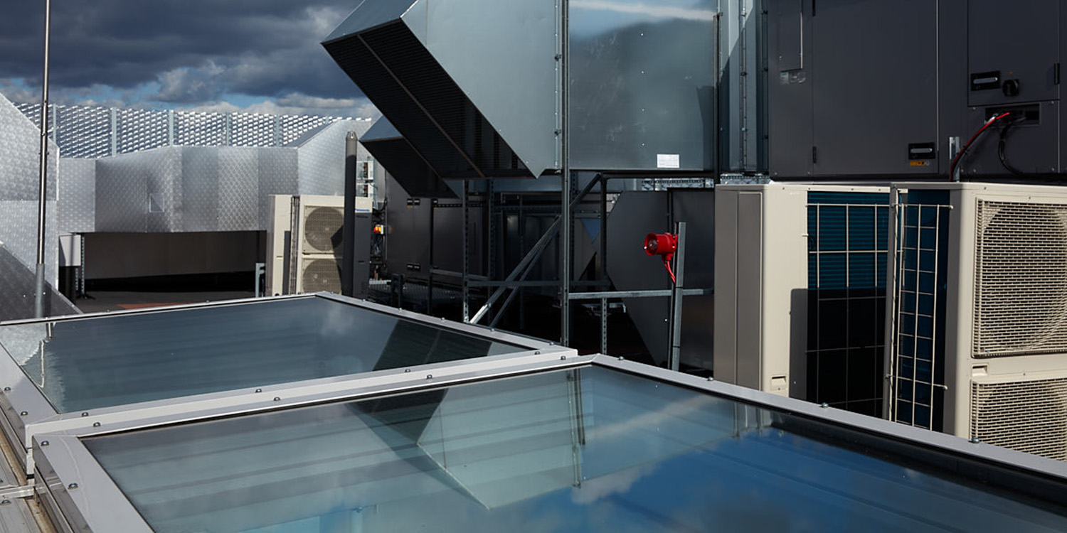 exterior view on cloudy day of glass roof